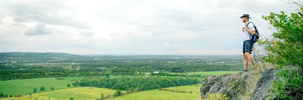 Hiker overlooking the land