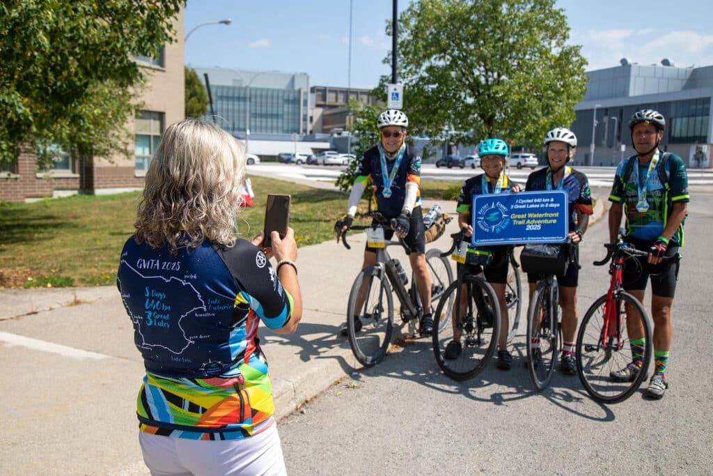 Cyclists posing for a photo.