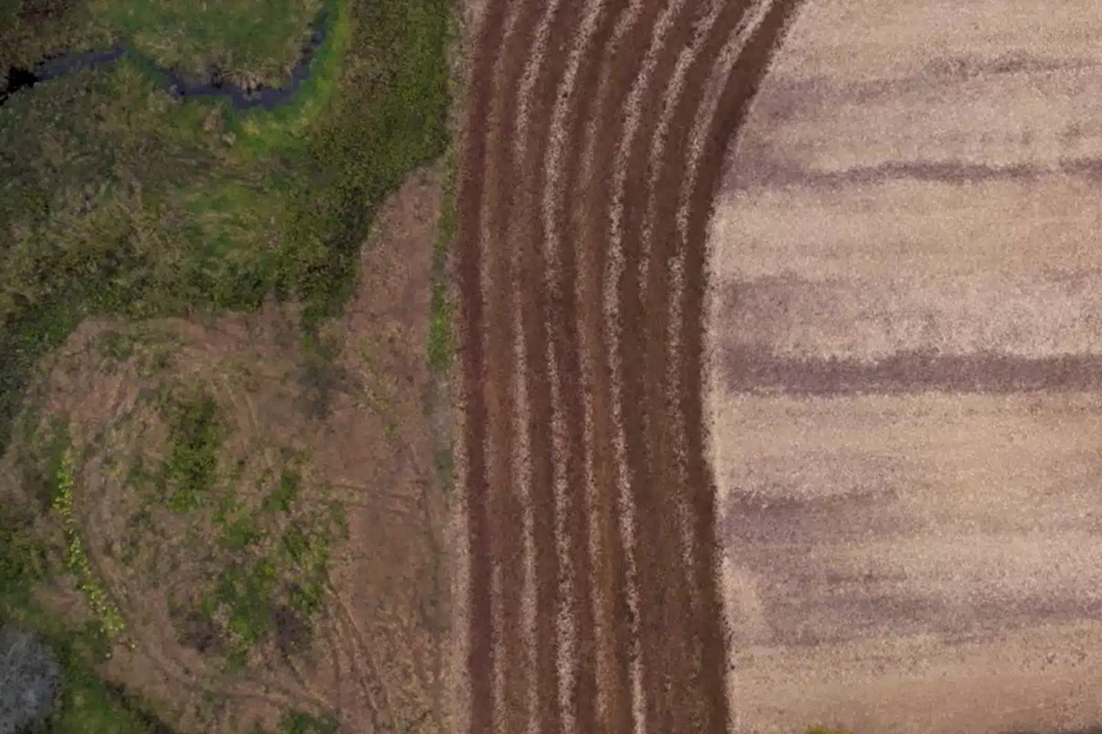 Aerial view of plowed fields.