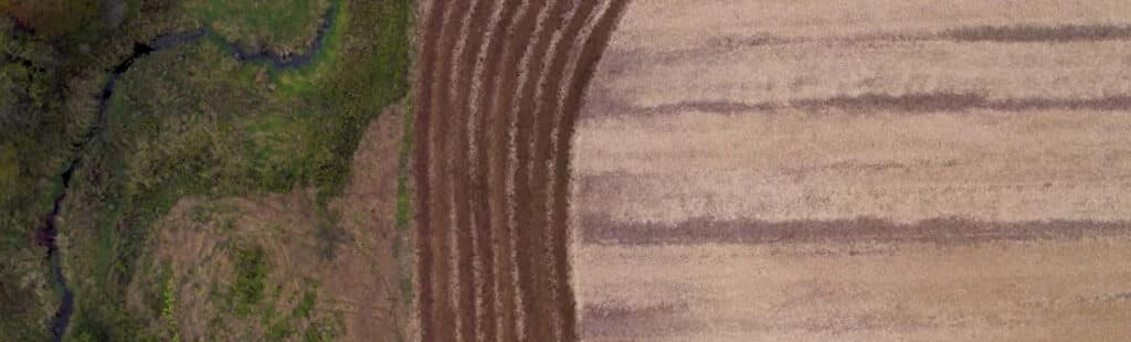 Aerial view of plowed fields.